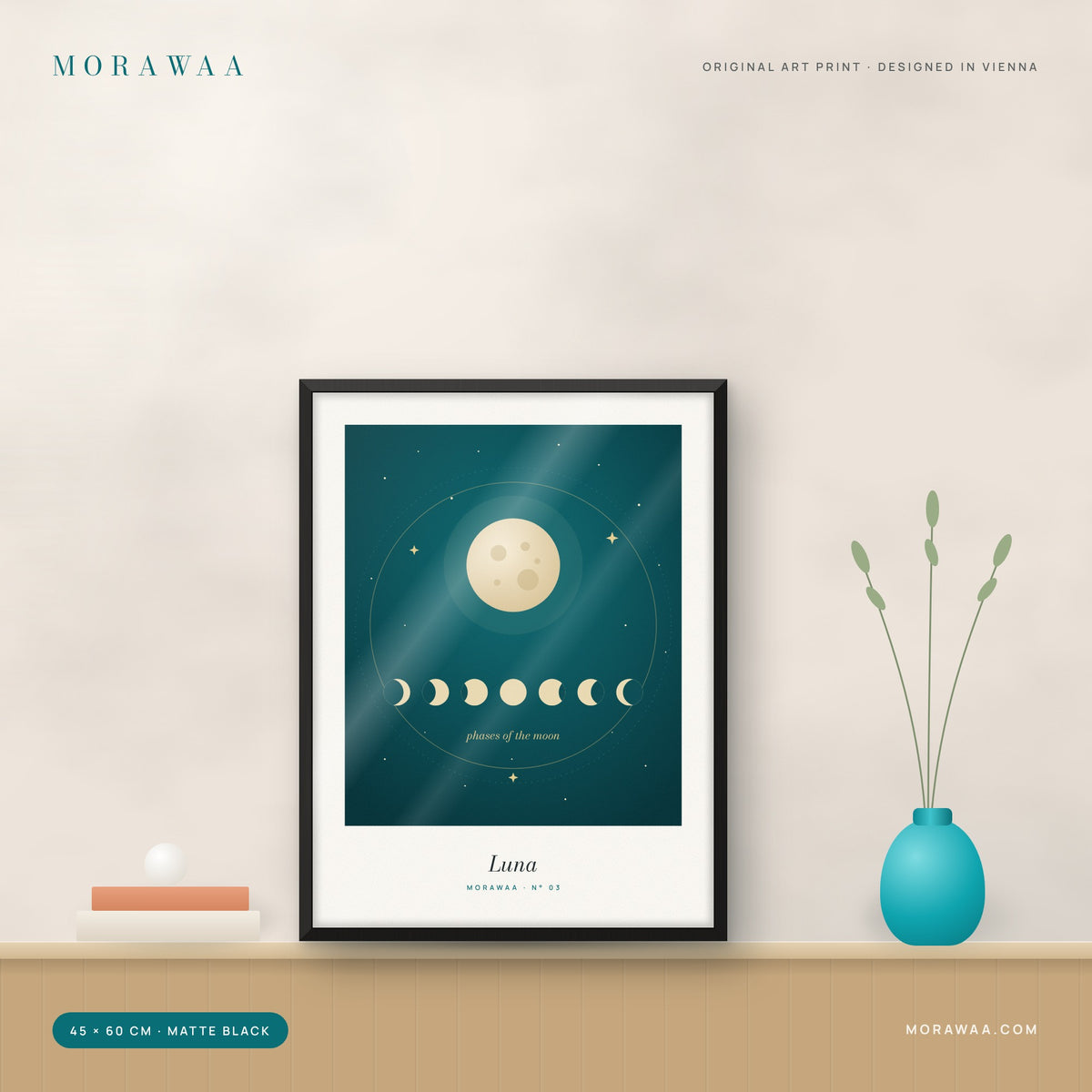 Luna moon phases framed art print in a matte black frame