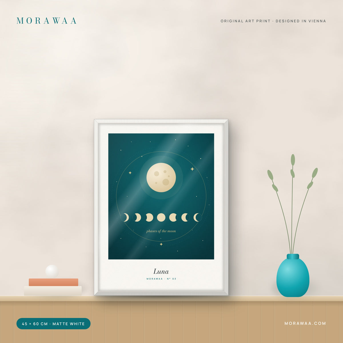 Luna moon phases framed art print in a matte white frame