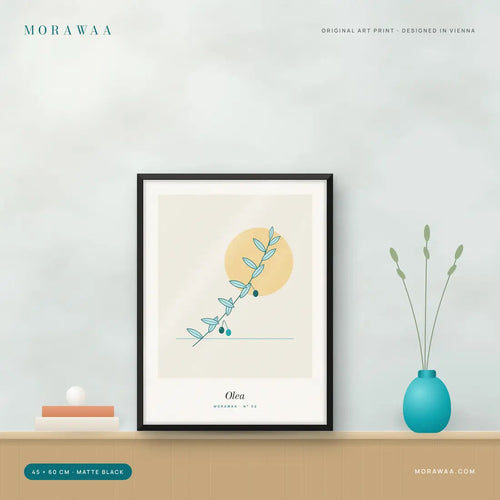 Olea Botanical Framed Art Print in a natural oak frame on a shelf